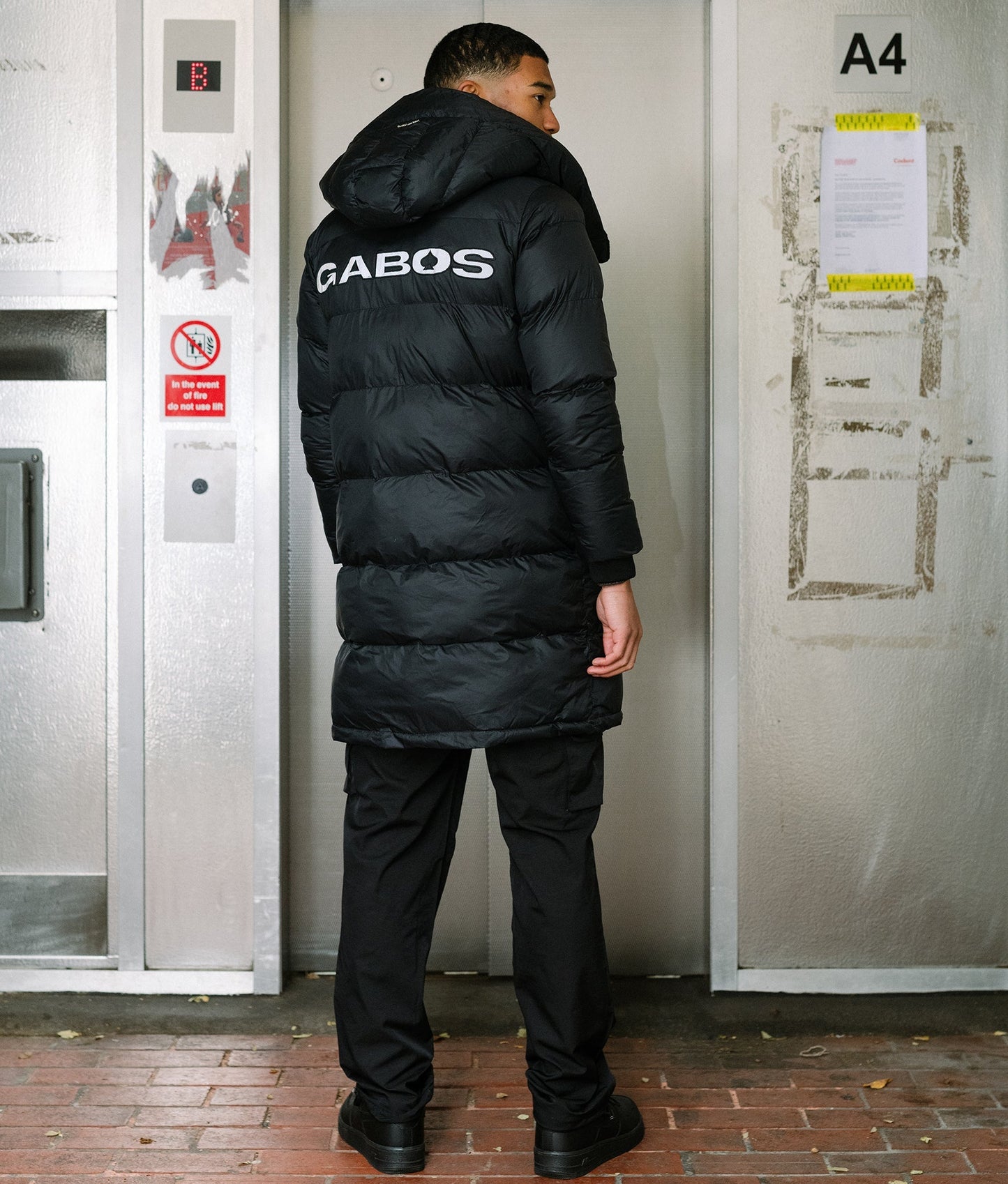 The “Street Sweeper” Black Puffer Down Trench Jacket