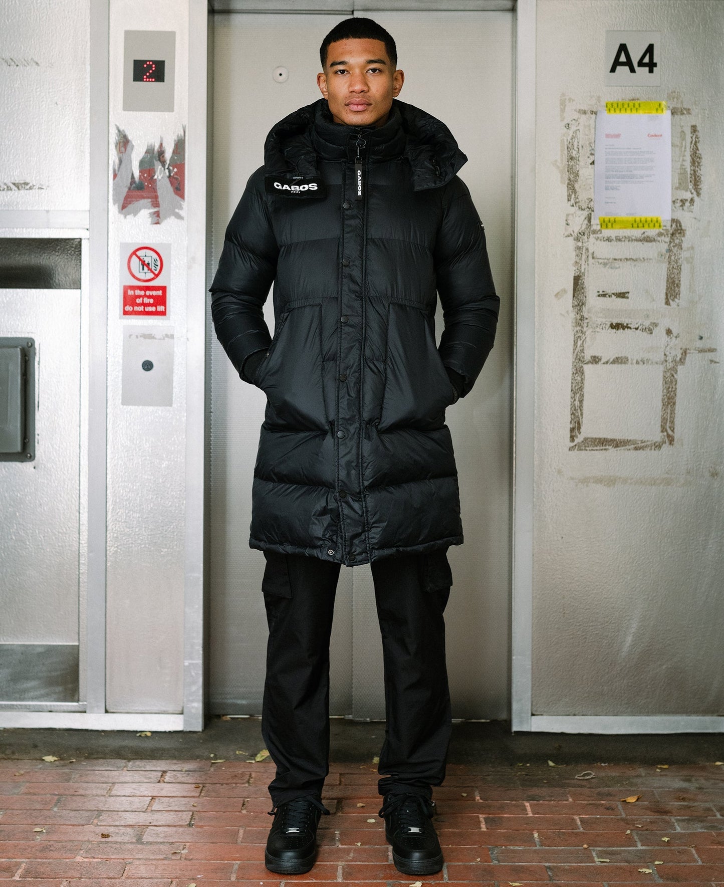 The “Street Sweeper” Black Puffer Down Trench Jacket